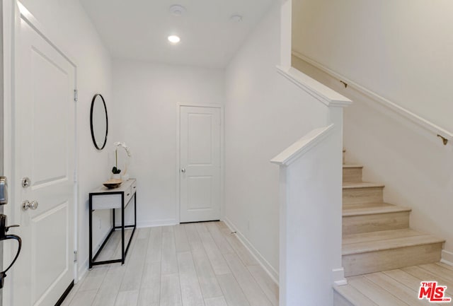 entryway with light wood-type flooring