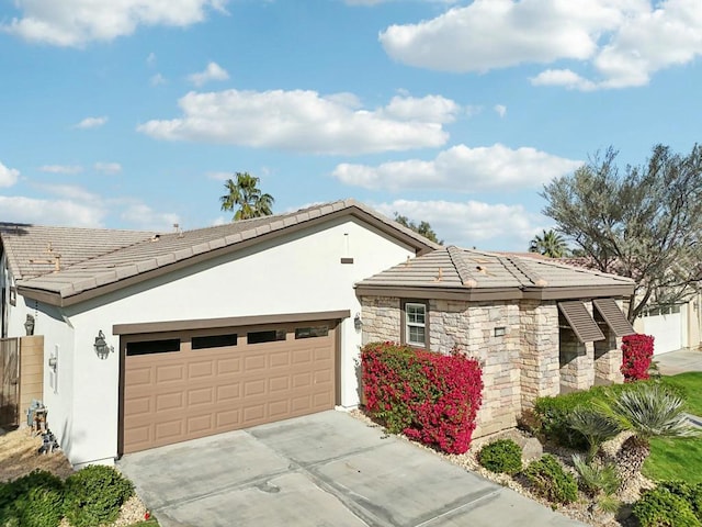 single story home with a garage