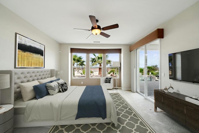 bedroom featuring light carpet, access to outside, and ceiling fan