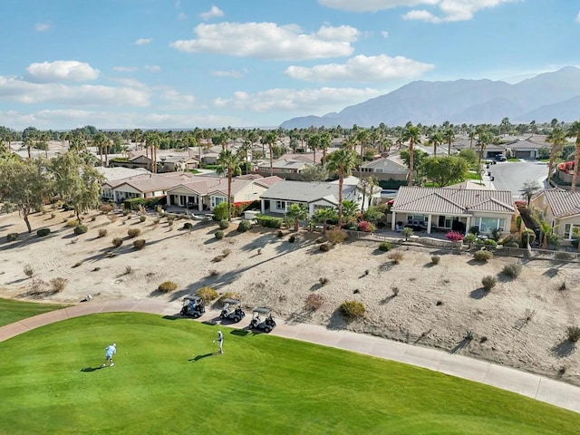 birds eye view of property featuring a mountain view