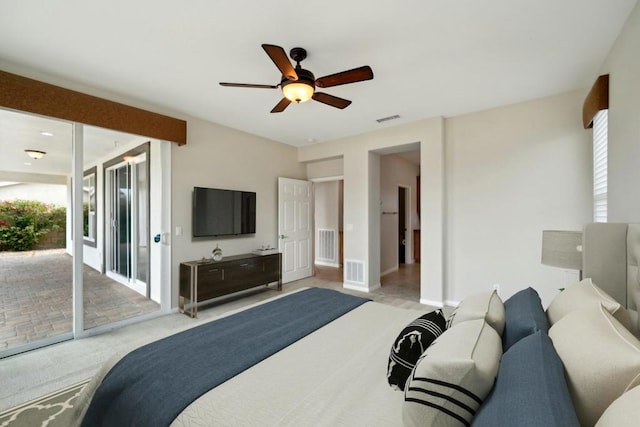 bedroom featuring ceiling fan, light carpet, and access to outside