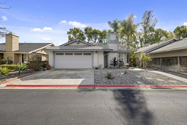 single story home featuring a garage