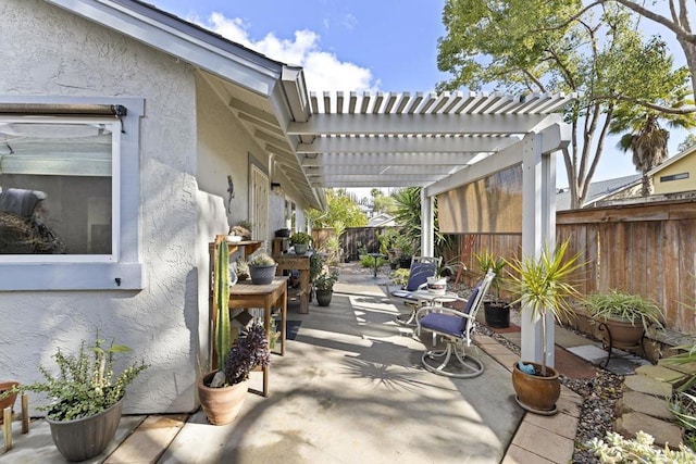 view of patio featuring a pergola