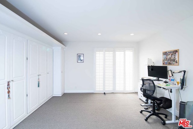 home office with light carpet