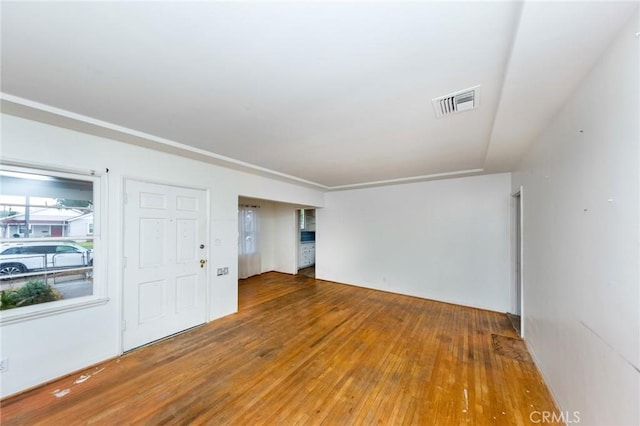 spare room featuring hardwood / wood-style floors