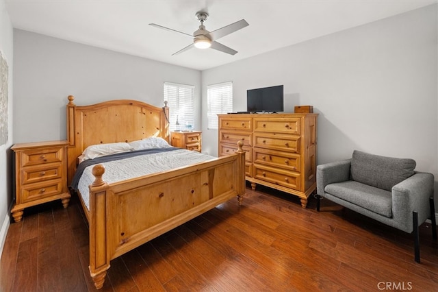 bedroom featuring dark wood-type flooring and ceiling fan