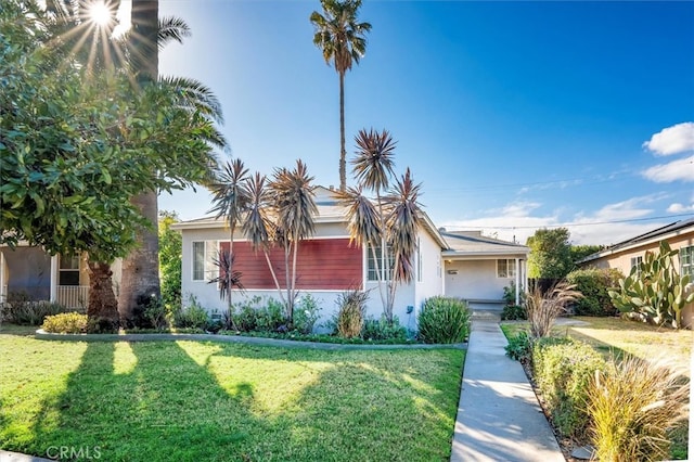 view of front of home with a front yard