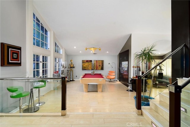 playroom with billiards, lofted ceiling, and light hardwood / wood-style floors