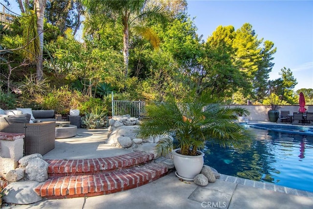 exterior space featuring a patio and an outdoor hangout area