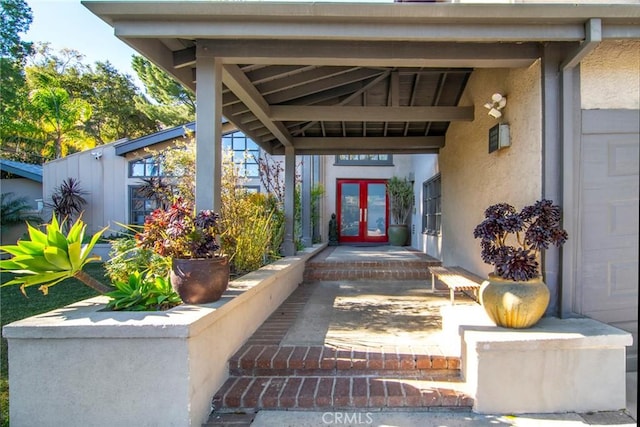 view of exterior entry with french doors