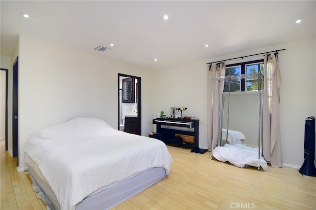 bedroom featuring light hardwood / wood-style flooring