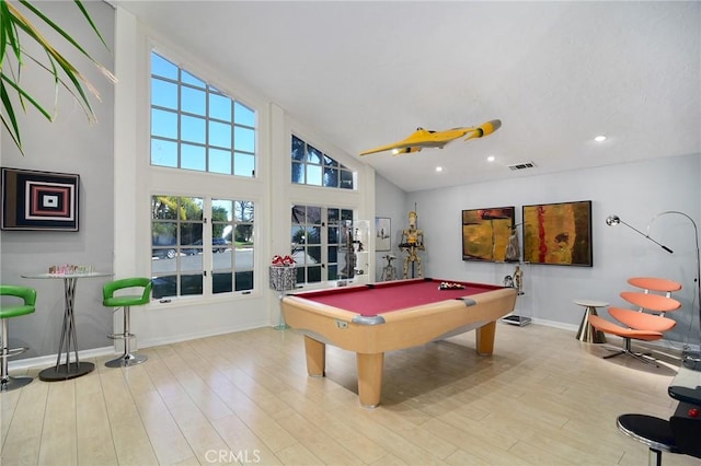 playroom with billiards, high vaulted ceiling, and light hardwood / wood-style flooring