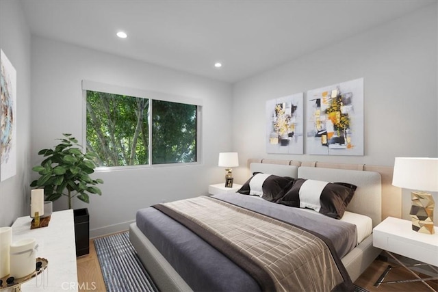 bedroom featuring hardwood / wood-style floors