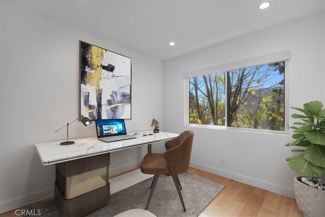 home office featuring hardwood / wood-style flooring