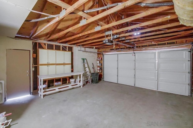 garage featuring a garage door opener