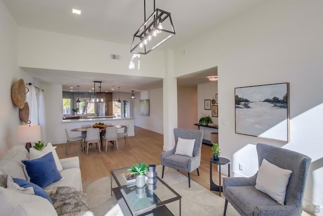 living room with light hardwood / wood-style flooring