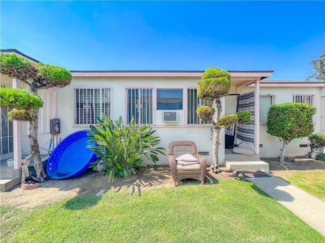 view of front of house with a front yard