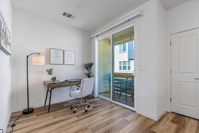 office area featuring light wood-type flooring