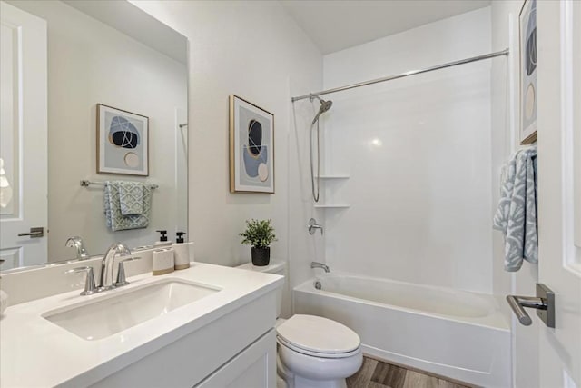 full bathroom with shower / bathtub combination, vanity, toilet, and wood-type flooring