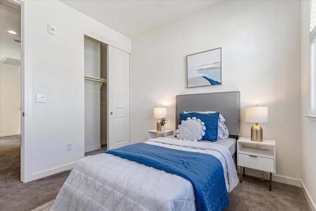 carpeted bedroom featuring a closet