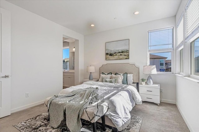 bedroom with light colored carpet