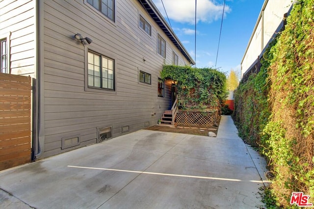 view of home's exterior featuring a patio