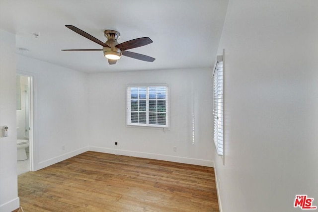 unfurnished room featuring ceiling fan and light hardwood / wood-style floors