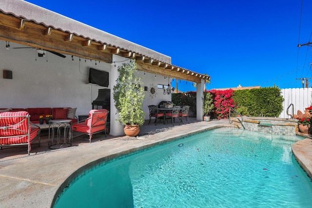 view of swimming pool featuring an in ground hot tub, an outdoor living space, and a patio area