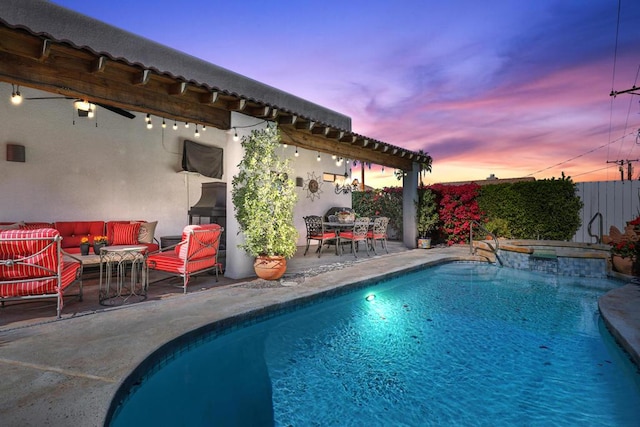 view of pool featuring an outdoor living space and a patio