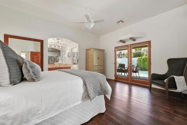 bedroom featuring dark hardwood / wood-style floors, access to outside, and ceiling fan