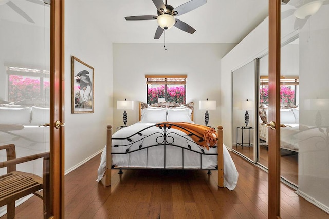 bedroom featuring hardwood / wood-style flooring, french doors, and ceiling fan