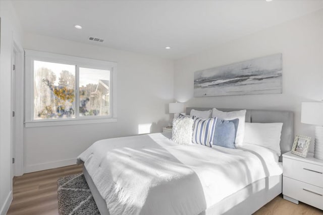 bedroom featuring light wood-type flooring