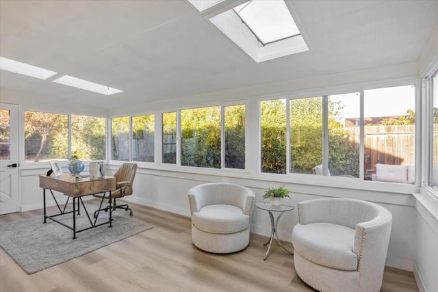 sunroom / solarium with a skylight