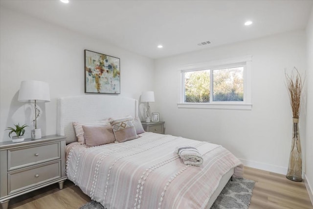 bedroom featuring light hardwood / wood-style flooring