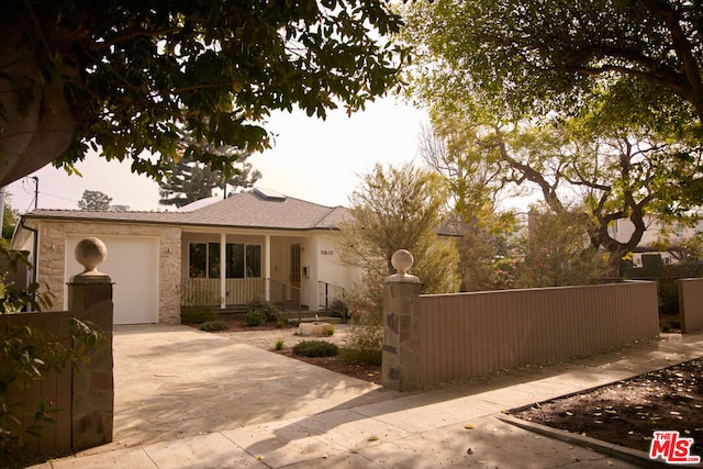 view of front of home with a garage