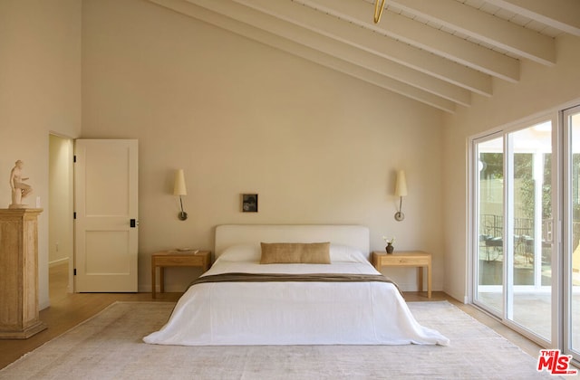 bedroom with light hardwood / wood-style flooring, access to outside, high vaulted ceiling, and beamed ceiling