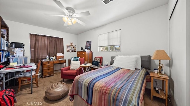 carpeted bedroom with ceiling fan