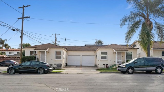 ranch-style home with a garage