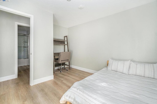 bedroom featuring light hardwood / wood-style flooring