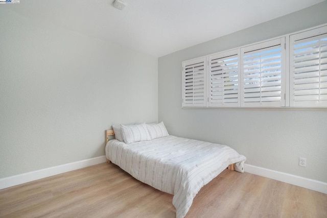 bedroom featuring light hardwood / wood-style flooring