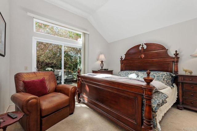 bedroom with access to outside, light colored carpet, and vaulted ceiling