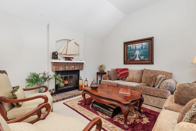 living room with lofted ceiling and a fireplace