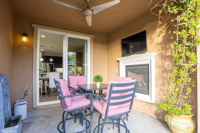 view of patio / terrace with ceiling fan