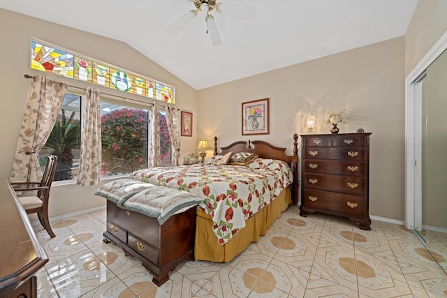 tiled bedroom with vaulted ceiling and ceiling fan