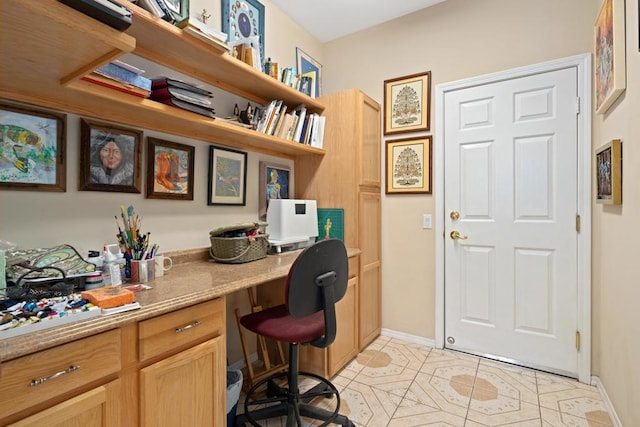 tiled office space with built in desk