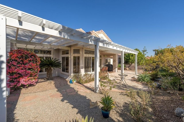 view of patio featuring a pergola