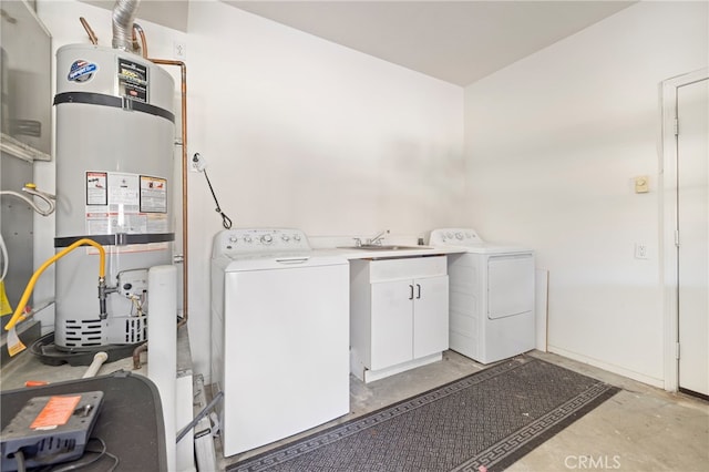 laundry room with cabinets, washer / dryer, sink, and strapped water heater