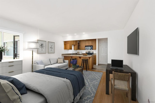 bedroom with light wood-type flooring