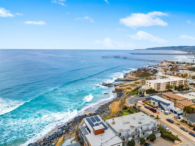 aerial view featuring a water view and a view of the beach