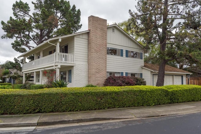 view of home's exterior featuring a balcony